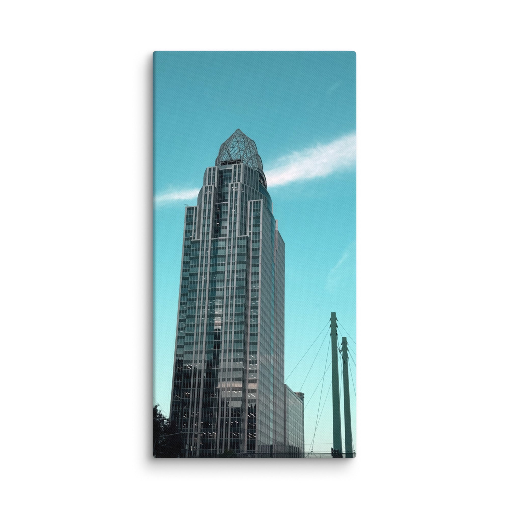 City building photo canvas print by Petals & Ash Studio, 12x24 wall art showcasing urban skyline and architectural details.