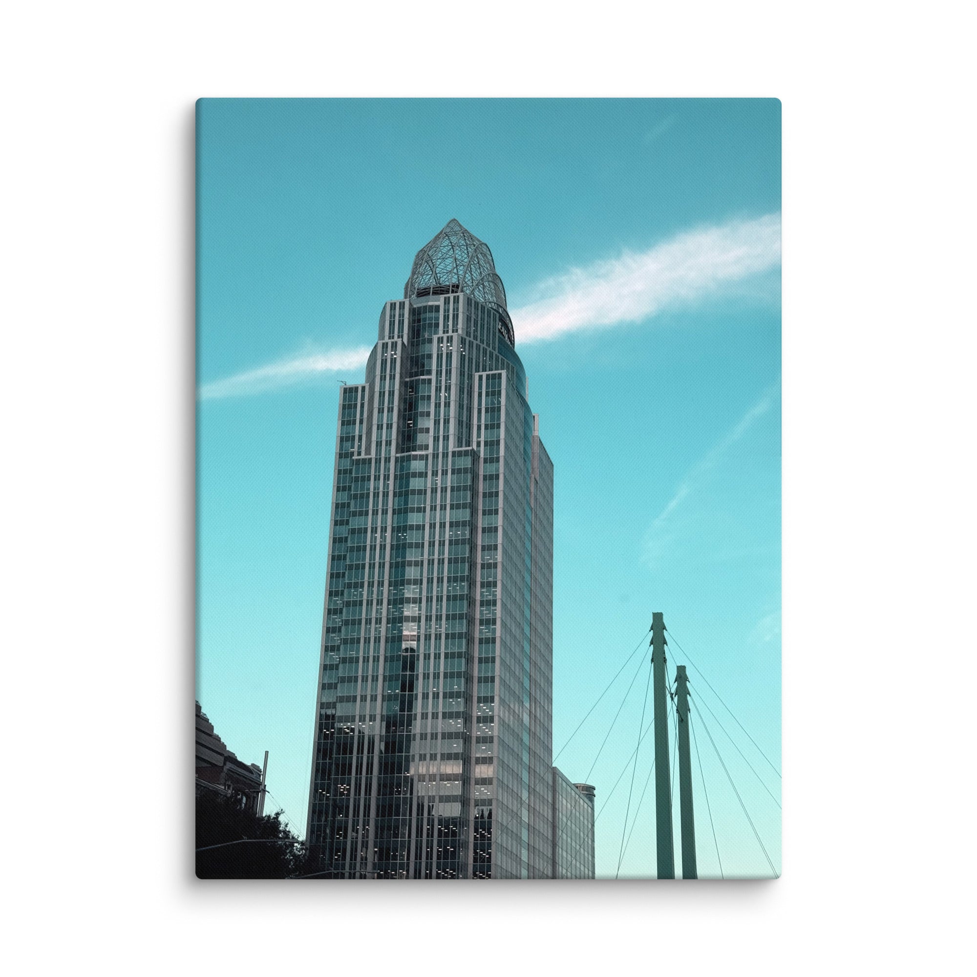 City building photo canvas print by Petals & Ash Studio featuring a vibrant urban skyline on an 18x24 inch canvas.