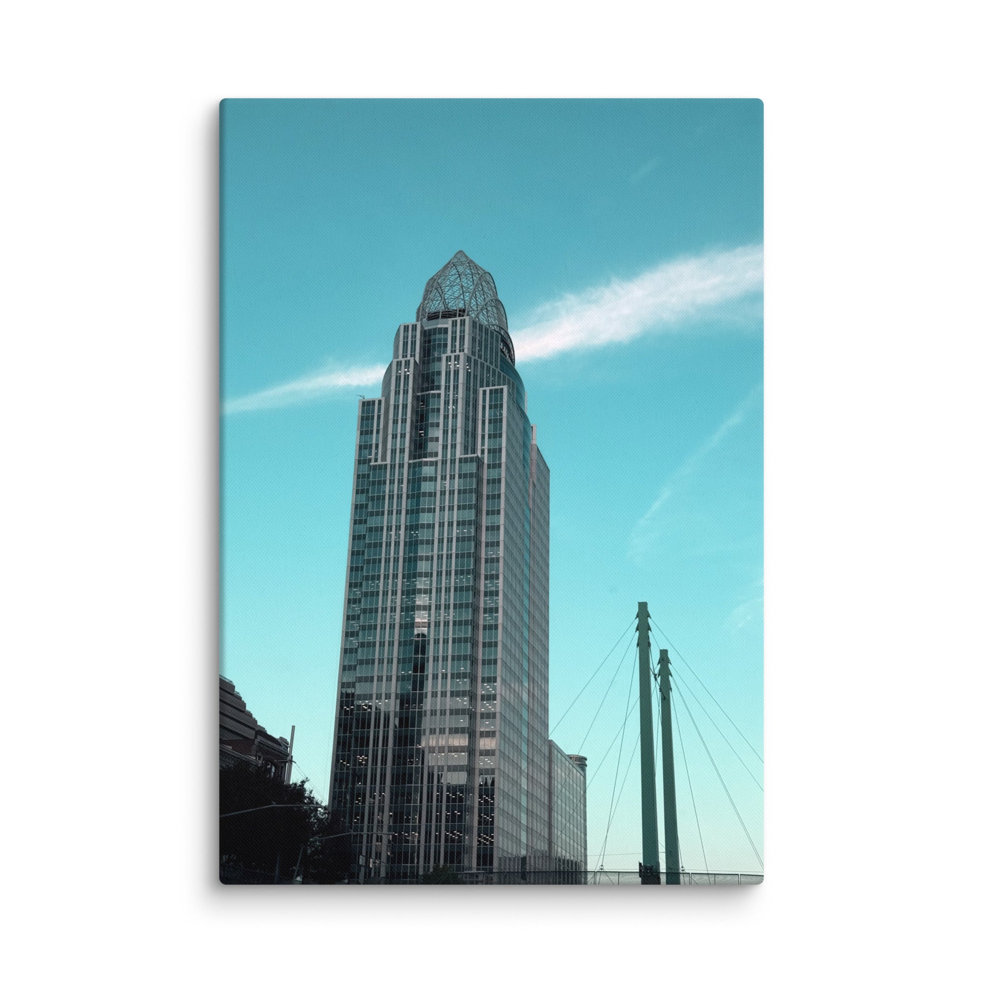 City building photo canvas print by Petals & Ash Studio showing a detailed urban skyline on an 18x26 wall art piece.