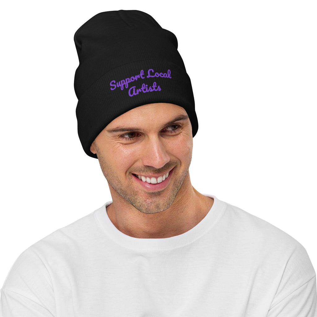 Black embroidered knit beanie featuring "Support Local Artists" text from Petals & Ash Studio, stylish and cozy winter accessory.