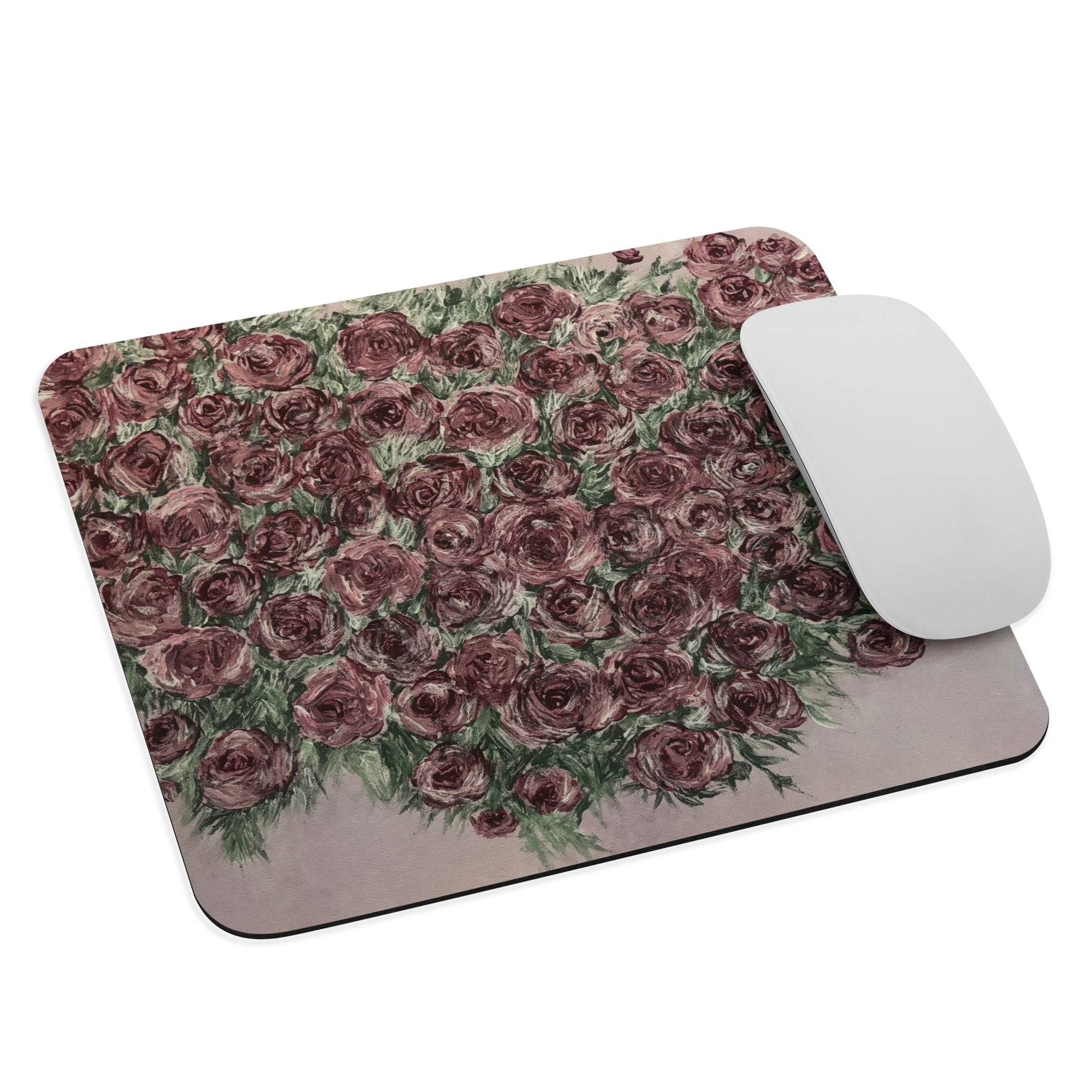 White sublimation mouse pad featuring a vibrant floral design with roses, from Petals & Ash Studio.