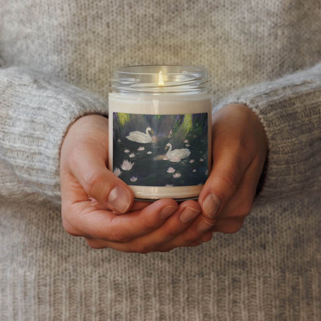 Petals & Ash Studio Swan Lake scented soy candle in a 9oz jar with warm Christmas scent and elegant label design.