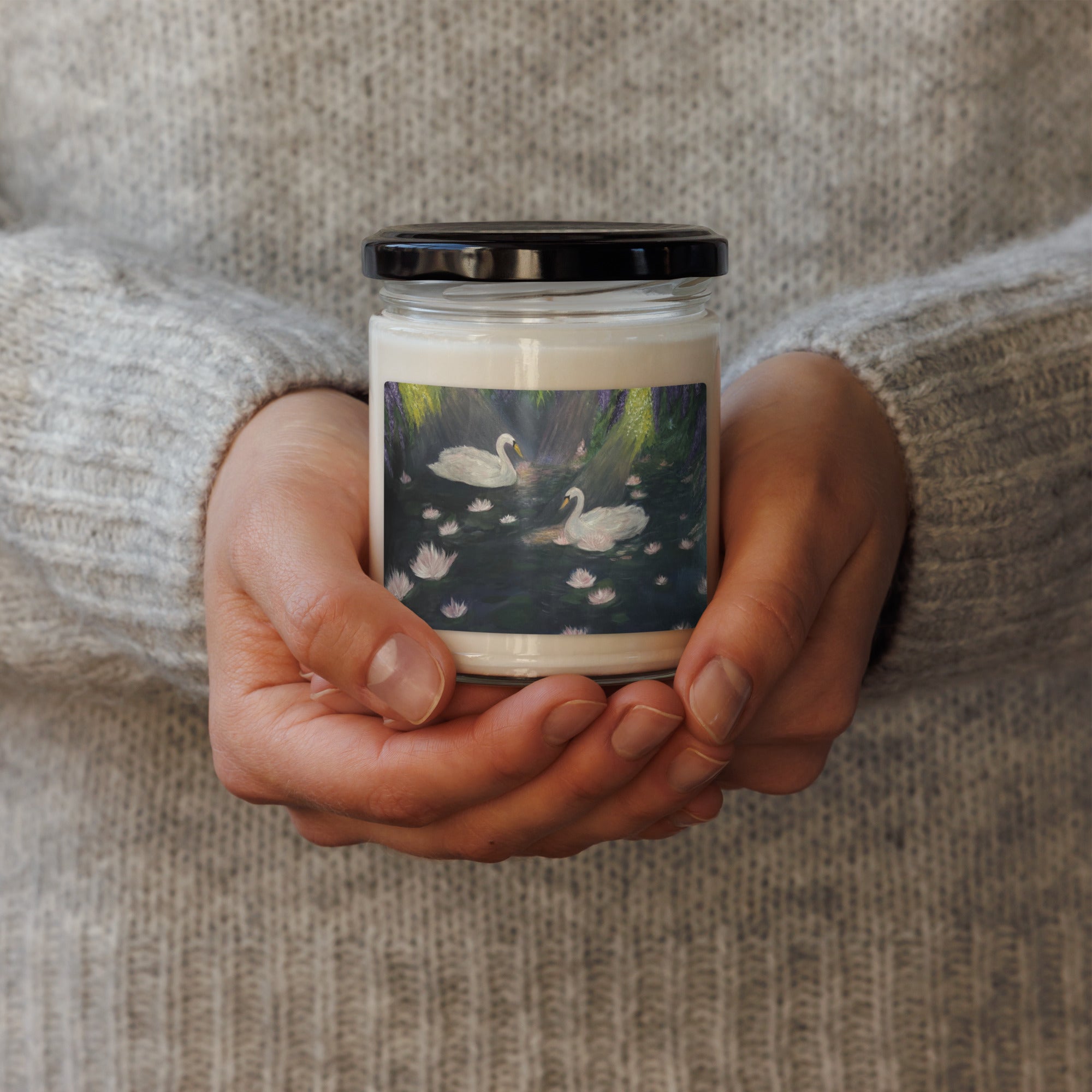 Petals & Ash Studio Swan Lake scented soy candle in 9oz white sage and lavender with a cozy, elegant design.