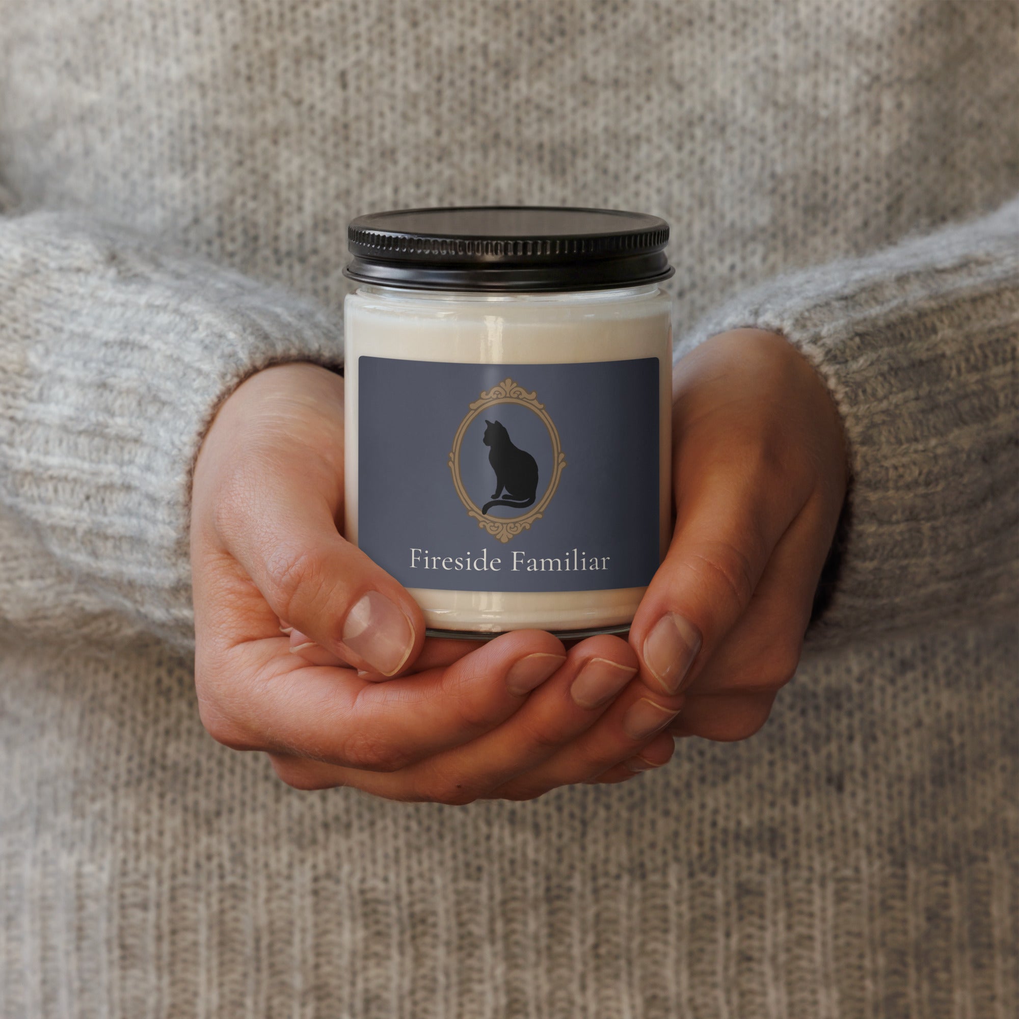 Black cat scented soy candle from Petals & Ash Studio featuring white sage and lavender in a 9oz container.