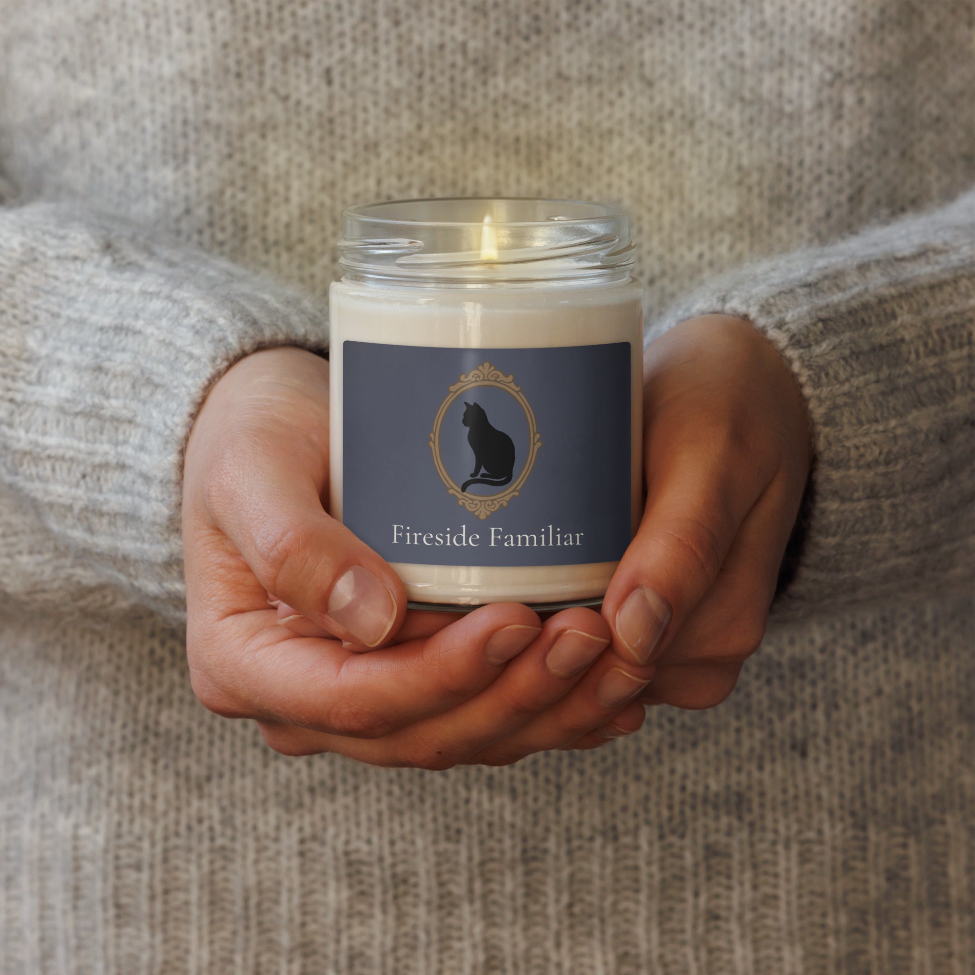 Black cat scented soy candle in a 9oz white jar with sage and lavender aroma, from Petals & Ash Studio.