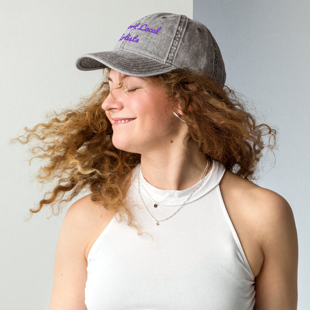 Charcoal grey vintage cotton twill cap with "Support Local Artists" embroidered logo, by Petals & Ash Studio, shown from the left side.
