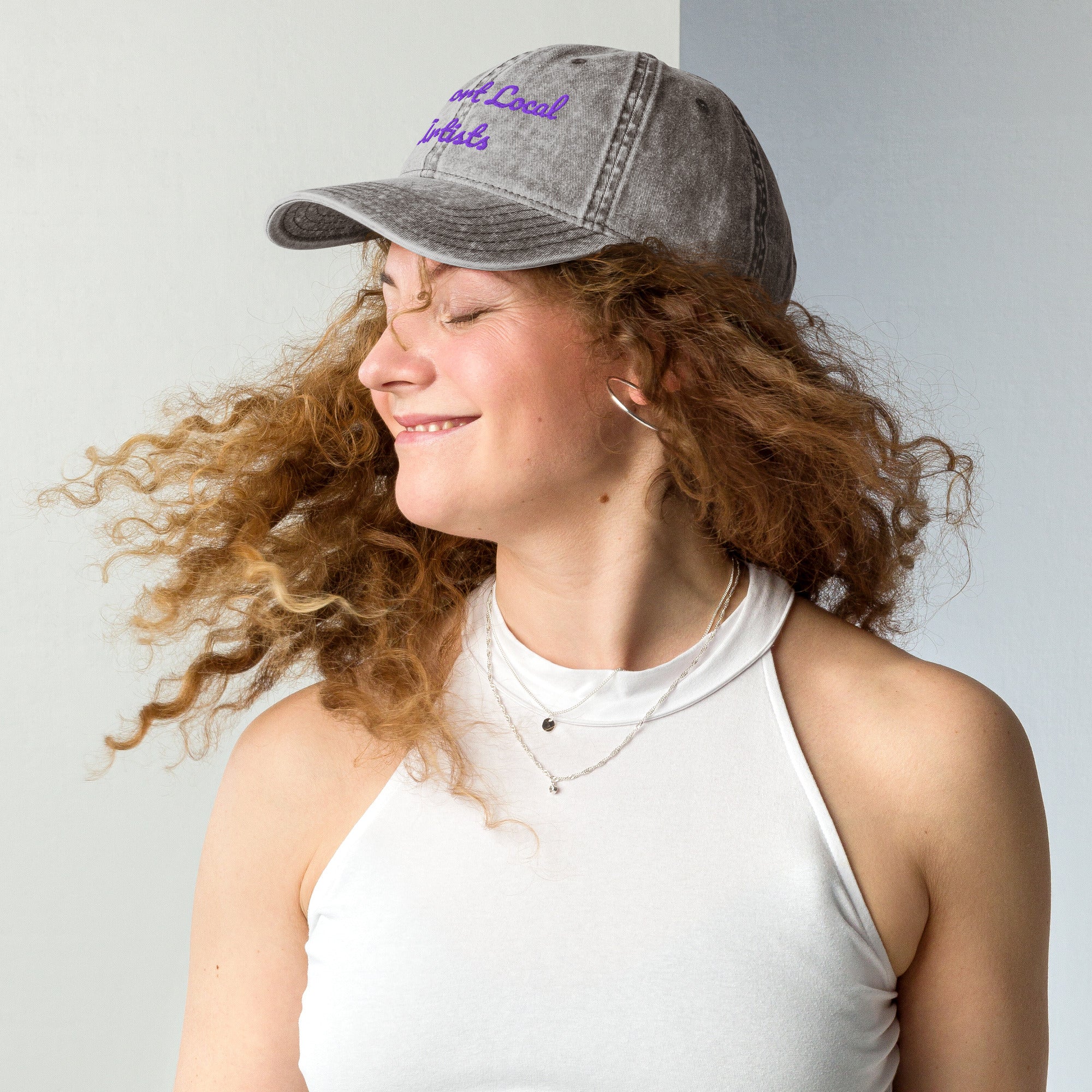 Charcoal grey vintage cotton twill cap with "Support Local Artists" embroidered logo, by Petals & Ash Studio, shown from the left side.