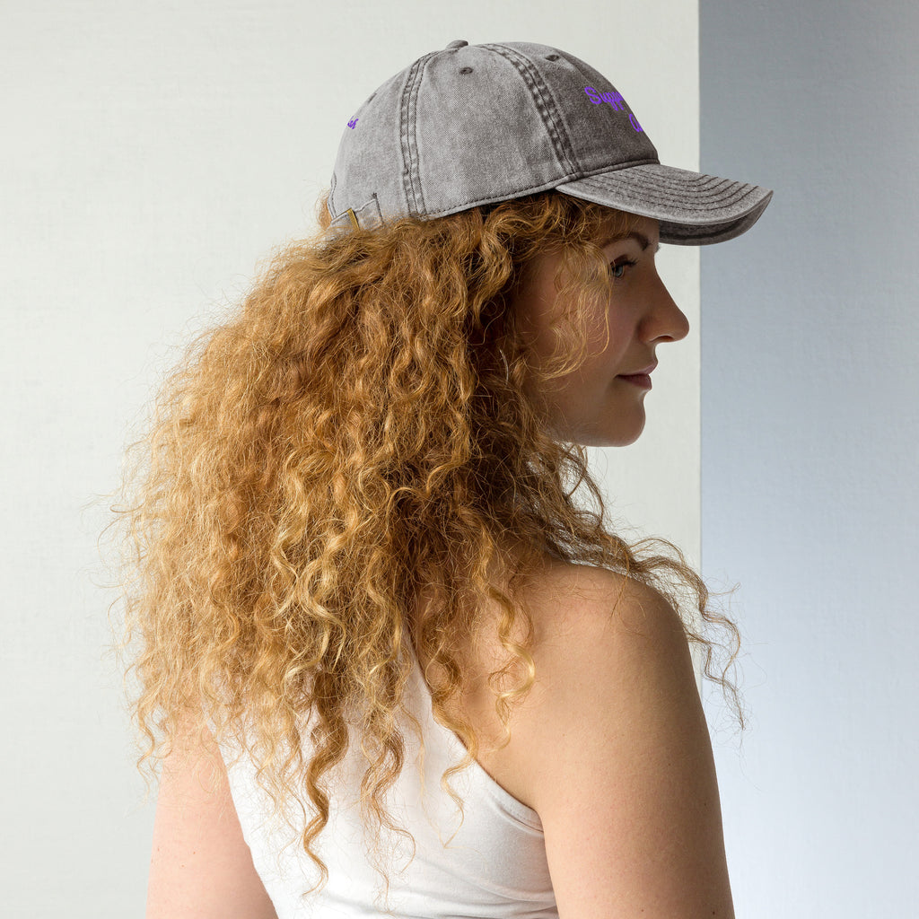 Charcoal grey vintage cotton twill cap with "Support Local Artists" embroidery from Petals & Ash Studio, shown from the right back angle.